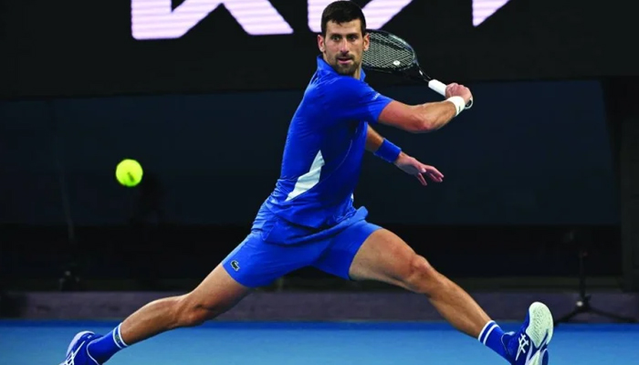 Serbia’s Novak Djokovic hits a return against Croatia’s Dino Prizmic in their Australian Open match.—AFP/File