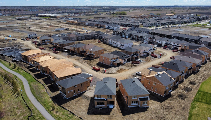 New homes are built in a housing construction development in the west end of Ottawa on May 6, 2021. — The Canadian Press via CTV