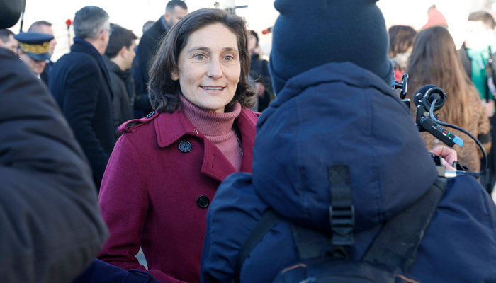 French Minister of Education, Sports, and Olympic Games, Amelie Oudea-Castera speaks to the press as she visits the 2024 Olympic Villlage in Saint-Denis, north of Paris on January 15, 2024. — AFP