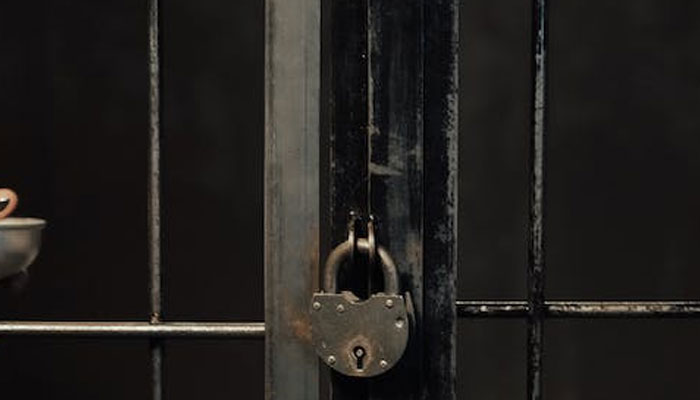 A representational image of a locked jail. — Pexels