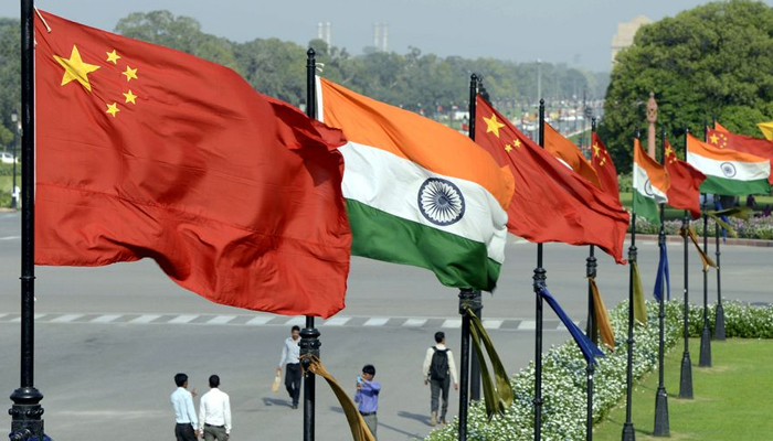 Indian and Chinese national flags flutter side by side at the Raisina hills in New Delhi, India. — Xinhua/File