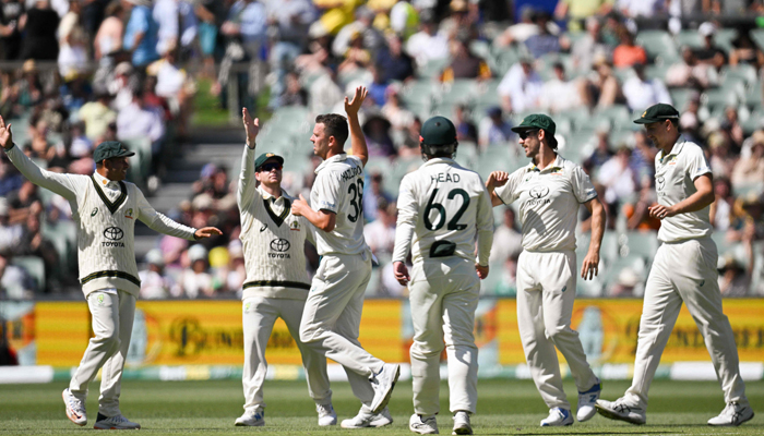 Australias Josh Hazlewood (3rd L) celebrates with teammates taking the wicket of West Indies Alick Athanaze during day two of the first cricket Test match at the Adelaide Oval in Adelaide on January 18, 2024. — AFP