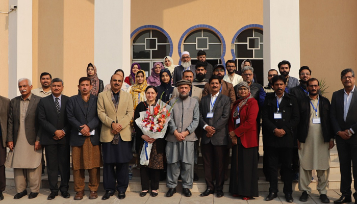 Participants pose a Four-day training workshop for the digitization of community teacher courses concluded at Allama Iqbal Open University (AIOU) on January 18, 2024. — Facebook/Allama Iqbal Open University