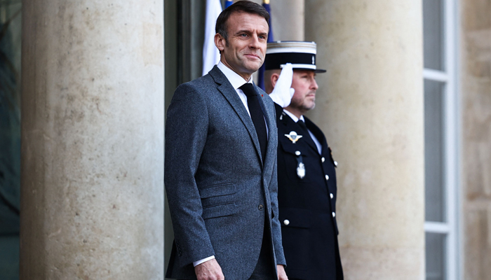 French President Emmanuel Macron waits to welcome Cambodias PM ahead of a meeting at the Elysee Presidential Palace, in Paris, on January 18, 2024. — AFP