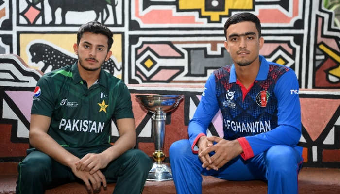 Saad Baig, the captain of the Pakistan U19 cricket team (L) sits with the Afghanistan team captain. — PCB