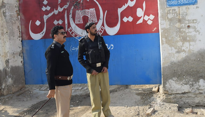 Police officials look on outside a police station in Lakki Marwat on January 19, 2024. — Facebook/Khyber Pakhtunkhwa Police