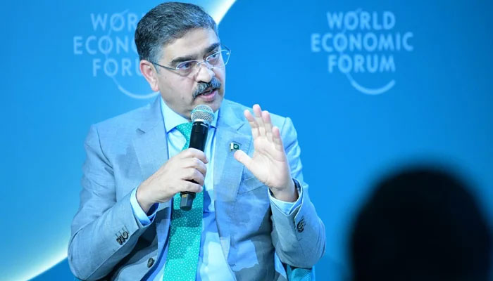 Caretaker PM Anwaar-ul-Haq Kakar expressing his views at the Trade Techs Trillion-Dollar Promise session of the World Economic Forum (WEF) in Davos on January 17, 2024. — PID