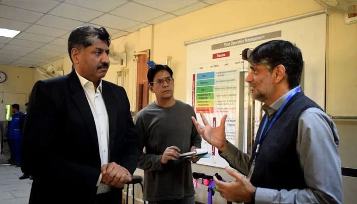 The image shows Director General Sports Punjab Dr Asif Tufail being briefed at the Ghurki hospital on Nov 21, 2023. — Facebook/Directorate General Sports & Youth Affairs, Punjab