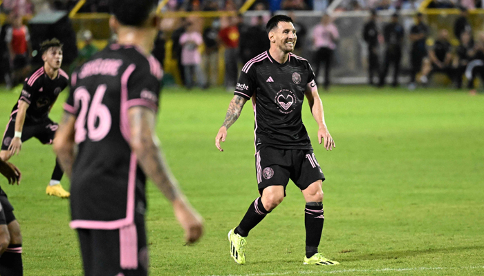 Lionel Messi smiles on the pitch during the friendly football match between the Salvadoran national team and US´ Inter Miami at the Cuscatlan stadium, in San Salvador, El Salvador, on January 19, 2024. — AFP