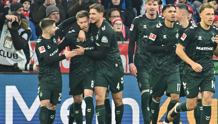Bremen defender Mitchell Weiser (2ndL) celebrates scoring the opening goal with his teammates on January 21, 2024. — AFP