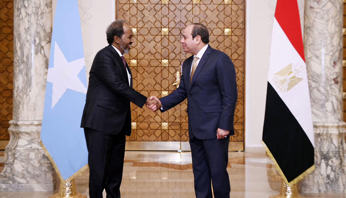 This picture shows Egyptian President Abdel Fattah al-Sisi (R) welcoming Somalias President Hassan Sheikh Mohamud, at Ittihadiya Palace in Cairo, on January 21, 2024. — AFP