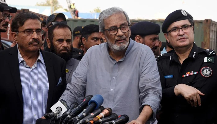 Caretaker Sindh CM Justice (r) Maqbool Baqar (c) talks to media at MA Jinnah Road, Seabreeze area while Minister Home Brigadier (retd) Haris Nawaz (L) and IG Police Raja Riffat Mukhtar are standing beside him on September 7, 2023. — Instagram/@sindhcmhouse