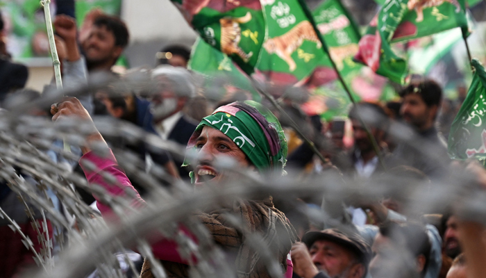 Supporters of the Pakistan Muslim League Nawaz (PMLN) party attend an election campaign rally of the party. — AFP
