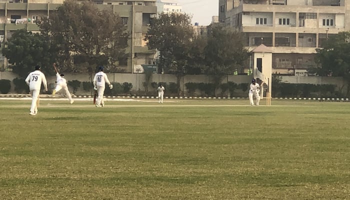 Cricket players can be seen during the Presidents Trophy match between Ghani Glass and State Bank of Pakistan. At the UBL Stadium in Karachi. — X/@mak_asif