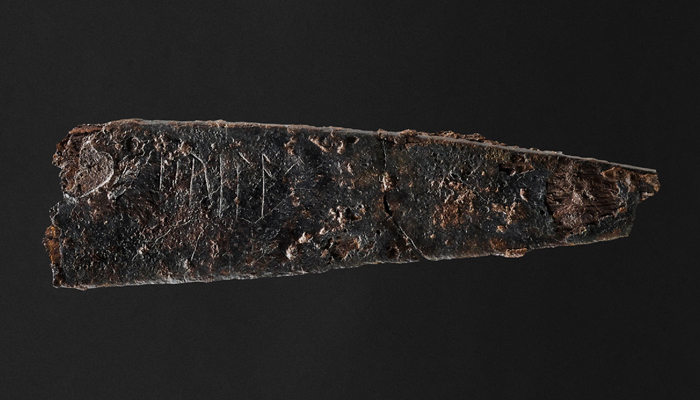 This undated Handout photo made available on January 23, 2024, by the Museum Odense in Odense, eastern Denmark shows a small knife inscribed with runes dating back almost 2,000 years. — AFP