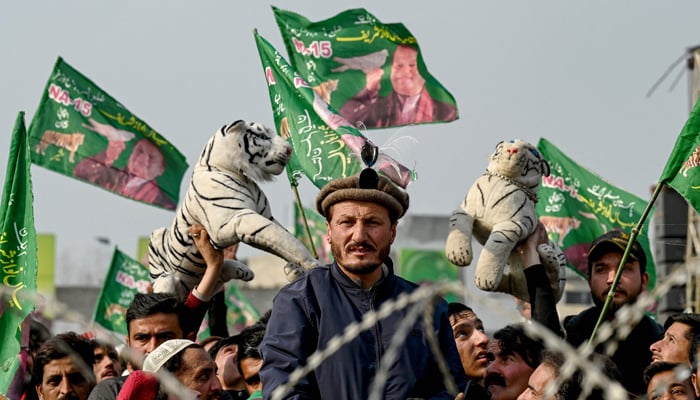 Supporters of the PMLN party attend an election campaign rally of party leader and Pakistans former Prime Minister Nawaz Sharif at Mansehra in Khyber Pakhtunkhwa province on January 22, 2024. — AFP