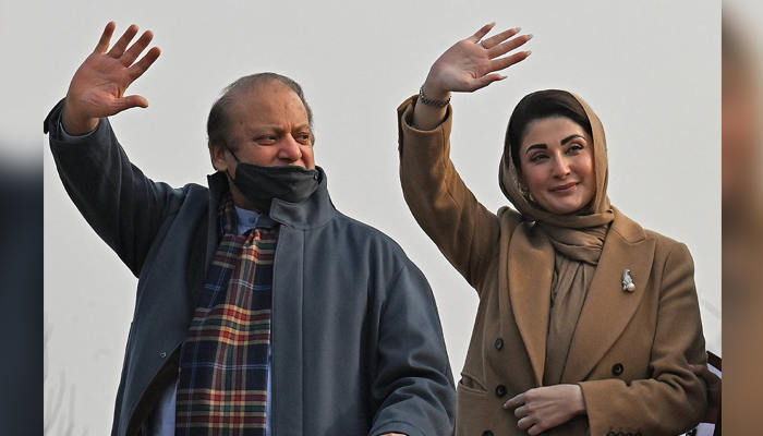 Pakistans former Prime Minister and leader of the PMLN party Nawaz Sharif (L) and his daughter Maryam Nawaz wave to their supporters during an election campaign rally at Mansehra in KPK province on January 22, 2024. — AFP