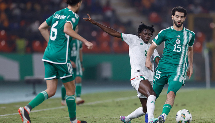 Algerias defender Rayan Ait-Nouri (R) fights for the ball with Mauritanias defender Ibrahima Keita during the Africa Cup of Nations 2024 group D football match between Mauritania and Algeria at Stade de la Paix in Bouake on January 23, 2024. — AFP