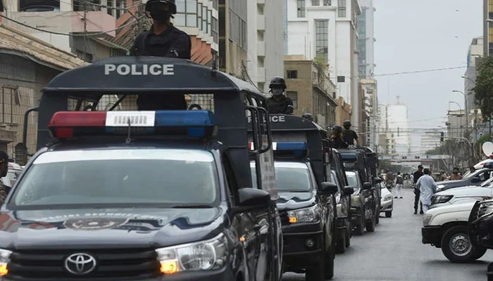 The Sindh Police vehicles can be seen in this image. —AFP/File