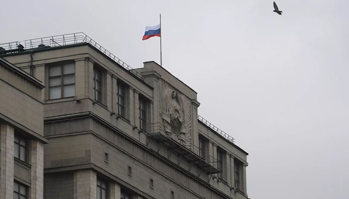The Russian flag flies on the building of State Duma in Moscow. — Sputnik/File