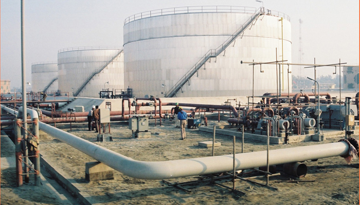 This image shows an oil facility with pipelines surrounding and connecting the large tank in the PARCO property. — Parco website