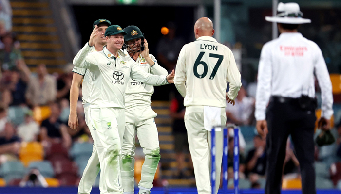 Steve Smith of Australia celebrates the dismissal of Joshua Da Silva of the West Indies during day one of the second cricket Test match between Australia and West Indies at the Gabba in Brisbane on January 25, 2024. — AFP
