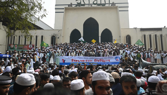 Islami Andolan Bangladesh party activists gather in front of a mosque after Friday prayers to take part in a protest rally against the recent inclusion of transgender content in the national textbook curriculum, in Dhaka on January 26, 2024. — AFP