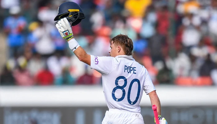 English cricketer Ollie Pope raises his helmet after scoring a century. — AFP/File