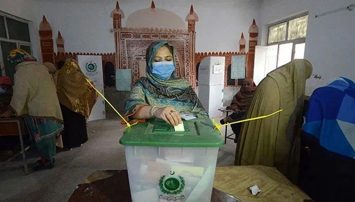 A woman casts her vote at a polling station in Khyber Pakhtunkhwa. — Geo. tv/ File