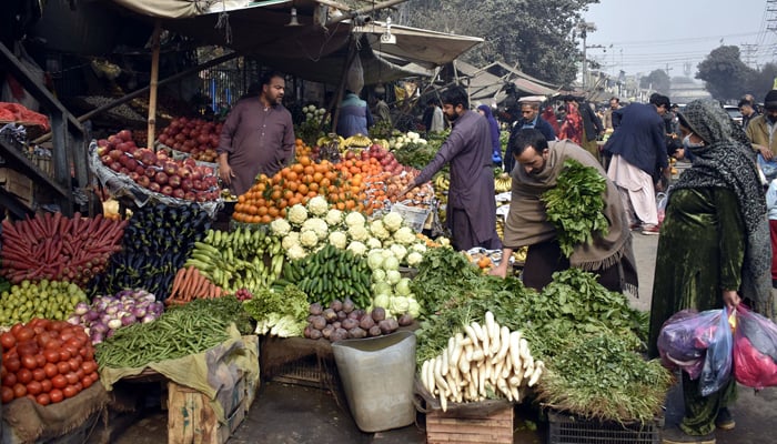 People are busy buying vegetables in front of Kotwali Police Station in  Lahore on January 28, 2024. —Online