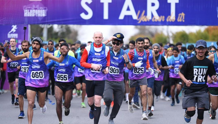 Hundreds of participants can be seen during the Marathon in Islamabad. — APP/File