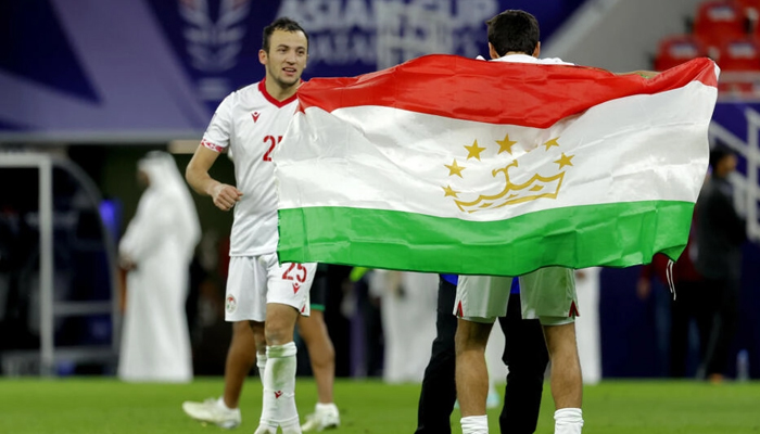 Asian Cup debutant Tajikistan team celebrates victory against UAE. — AFP/File