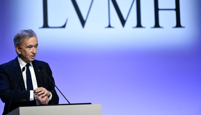 The worlds top luxury group LVMH head Bernard Arnault presents the groups 2023 annual results in Paris, on January 25, 2024. — AFP