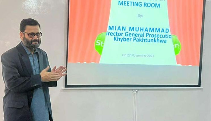 The image released on Nov 27, 2023 shows Director General of Prosecution Department, government of KP, Mian Muhammad inaugurating the meeting room in the Prosecution Monitoring Cell. — Facebook/kpprosecution