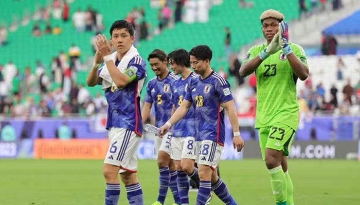 Japans players greet their supporters after the Qatar 2023 AFC Asian Cup football match against Bahrain. — AFP/File
