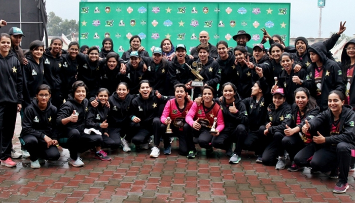Lahore and Karachi teams posing with the trophy of the National Women’s T20 Tournament 2023-24 on January 31, 2024. — PCB website