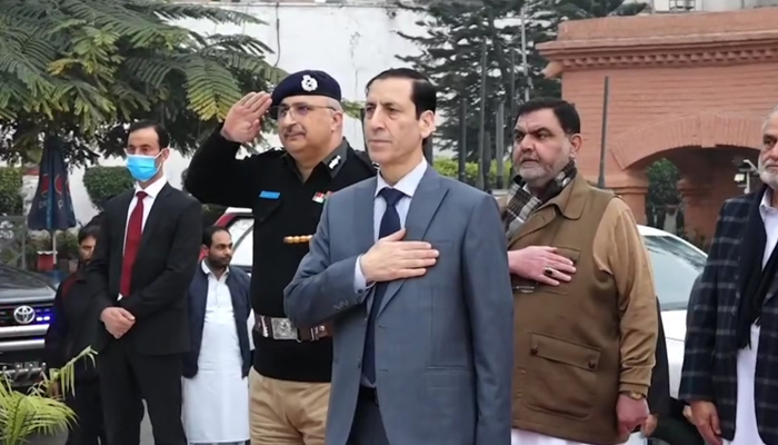 KP Caretaker Chief Minister Syed Arshad Hussain Shah pays homage to the martyrs of the biggest attack on the KP Police force in January, last year on January 31, 2024. — Facebook/Syed Arshad Hussain Shah