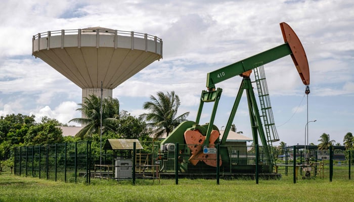 This picture taken on January 12, 2024, shows onshore oil pumps in Tutong district in Brunei. — AFP