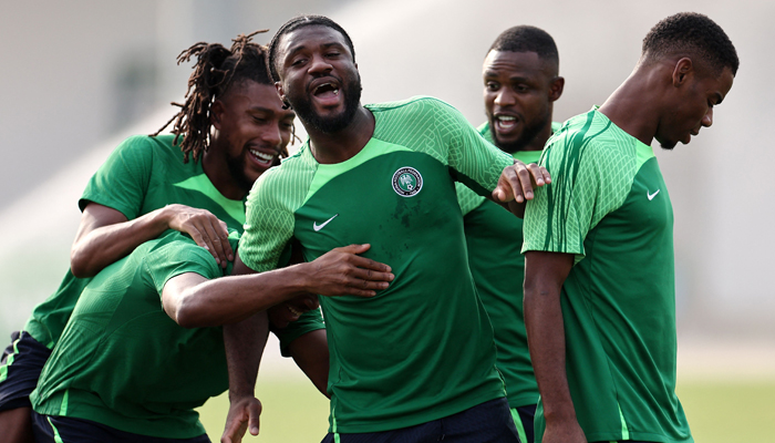 Nigerias Terem Moffi (C) jokes with teammates during a training session at the National Police School stadium in Abidjan on February 1, 2024 on the eve of the Africa Cup of Nations (CAN) 2024 football match between Nigeria and Angola. — AFP
