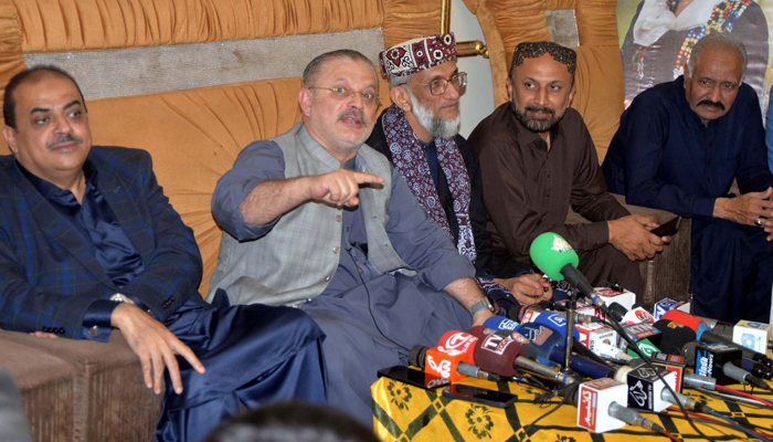 PPP Leader, Sharjeel Inam Memon addresses media persons during a press conference, Jamiat Ulema-e-Islam (JUP) President, Sahibzada Abul Khair Muhammad Zubair is also present in Hyderabad on February 1, 2024. — PPI