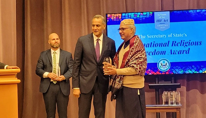 Peter Jacob (R) while receiving the Department of States International Religious Freedom Award on the 25th anniversary of the International Religious Freedom Act 1998 on January 21, 2024. — Facebook/Peace & Justice Network - PJN