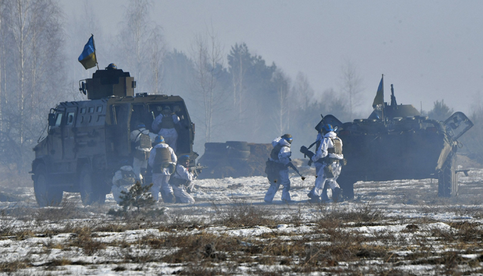 Ukrainian servicemen take part in military exercises by assault units in the Zhytomyr region on January 30, 2024. — AFP