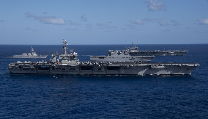 From (L-R): Arleigh Burke-class guided-missile destroyer USS Daniel K. Inouye, Nimitz-class aircraft carrier USS Carl Vinson, Hyuga-class helicopter destroyer JS Ise, and Nimitz-class aircraft carrier USS Theodore Roosevelt sail in formation during Multi-Large Deck Event (MLDE) on January 31, 2024. — X/@USPacificFleet