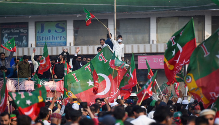 Supporters of the Pakistan Tehreek-e-Insaf (PTI) party shout slogans and protest to demand the release of Pakistans jailed former prime minister Imran Khan, in Karachi on January 28, 2024. — AFP