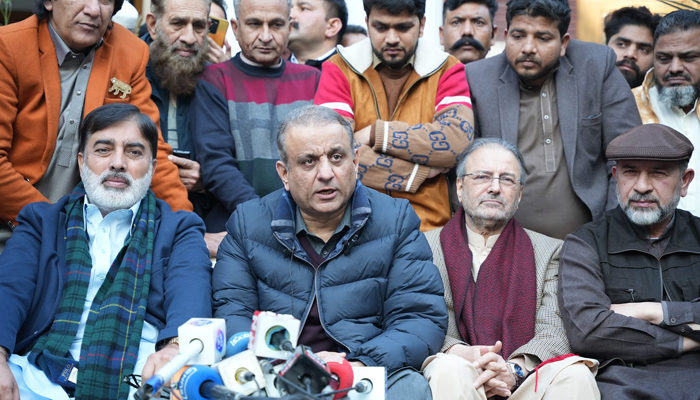 IPP President Abdul Aleem Khan addresses a press conference with ex-MNA Malik Riaz (L) in NA-117 Lahore on February 2, 2024. — Facebook/Abdul Aleem Khan