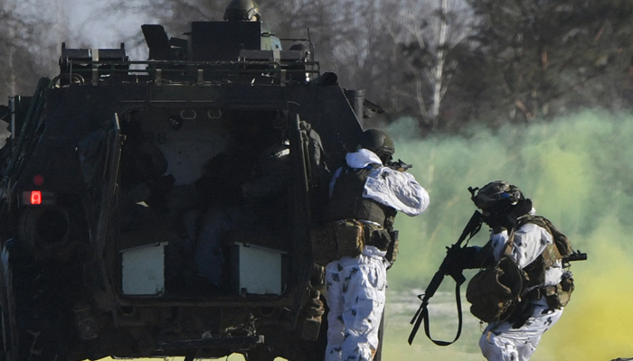 Ukrainian servicemen take part in military exercises by assault units in Zhytomyr region on January 30, 2024. — AFP