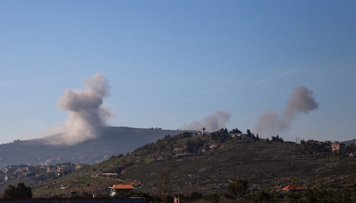 Smoke billows following Israeli strikes on the southern Lebanese village of Kfar Kila near the border with Israel on January 18, 2024. — AFP