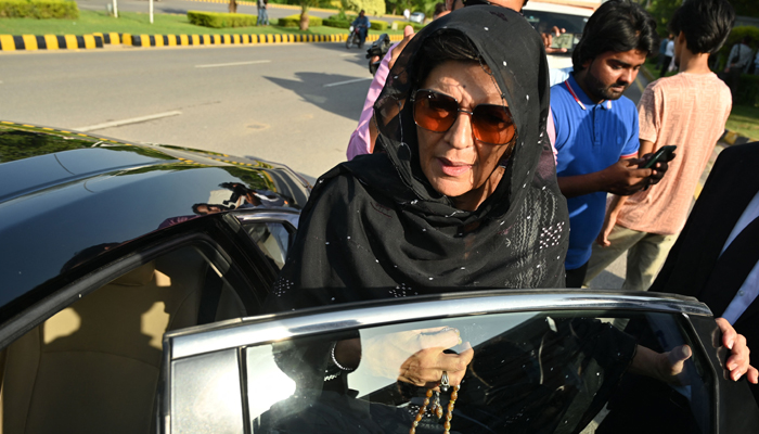 Aleema Khan (C) sister of former PM Imran Khan, is seen outside the High Court in Islamabad on August 28, 2023. — AFP