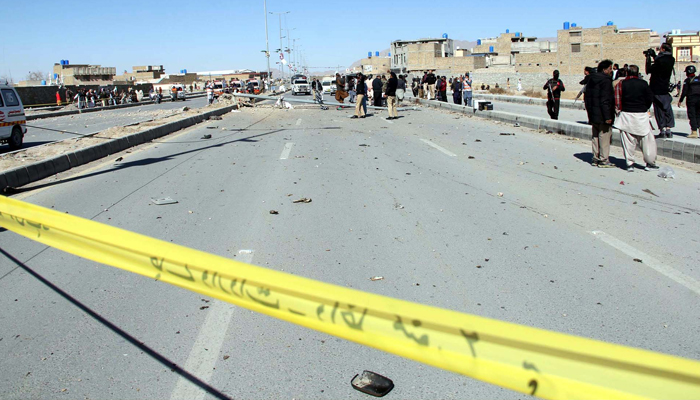 Police officials cordoned off the area and are ascertaining the nature of the blast after the explosion, at Spinny Road in Quetta on Thursday, February 1, 2024. — PPI