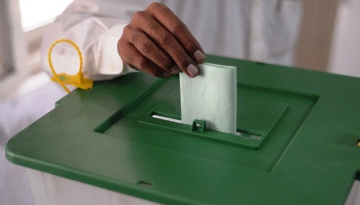 A person can be seen casting his vote in Pakistan. — AFP/File